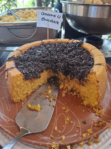 Representative photograph of Brazilian Carrot Cake. The photograph uses a ring mould and chocolate sprinkles; this draft uses a round tin and a chocolate glaze.