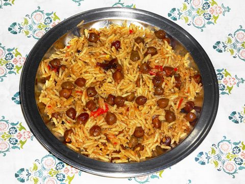 Representative photograph of Chana Pulao. The photograph uses dark kala chana; this draft uses cooked pale chickpeas.