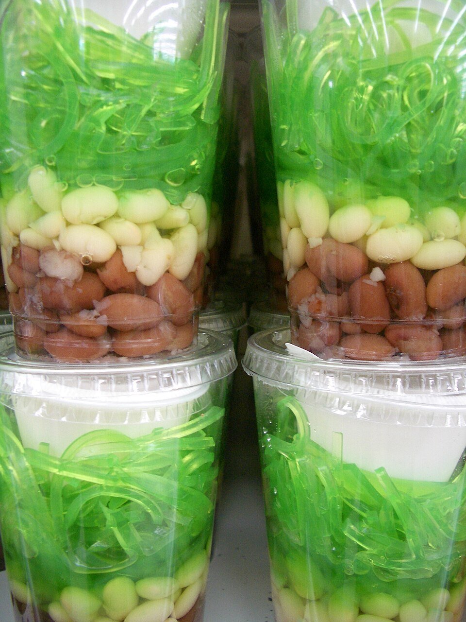 Representative photograph of Che Ba Mau. The photograph shows the dessert layers before the coconut topping is added.