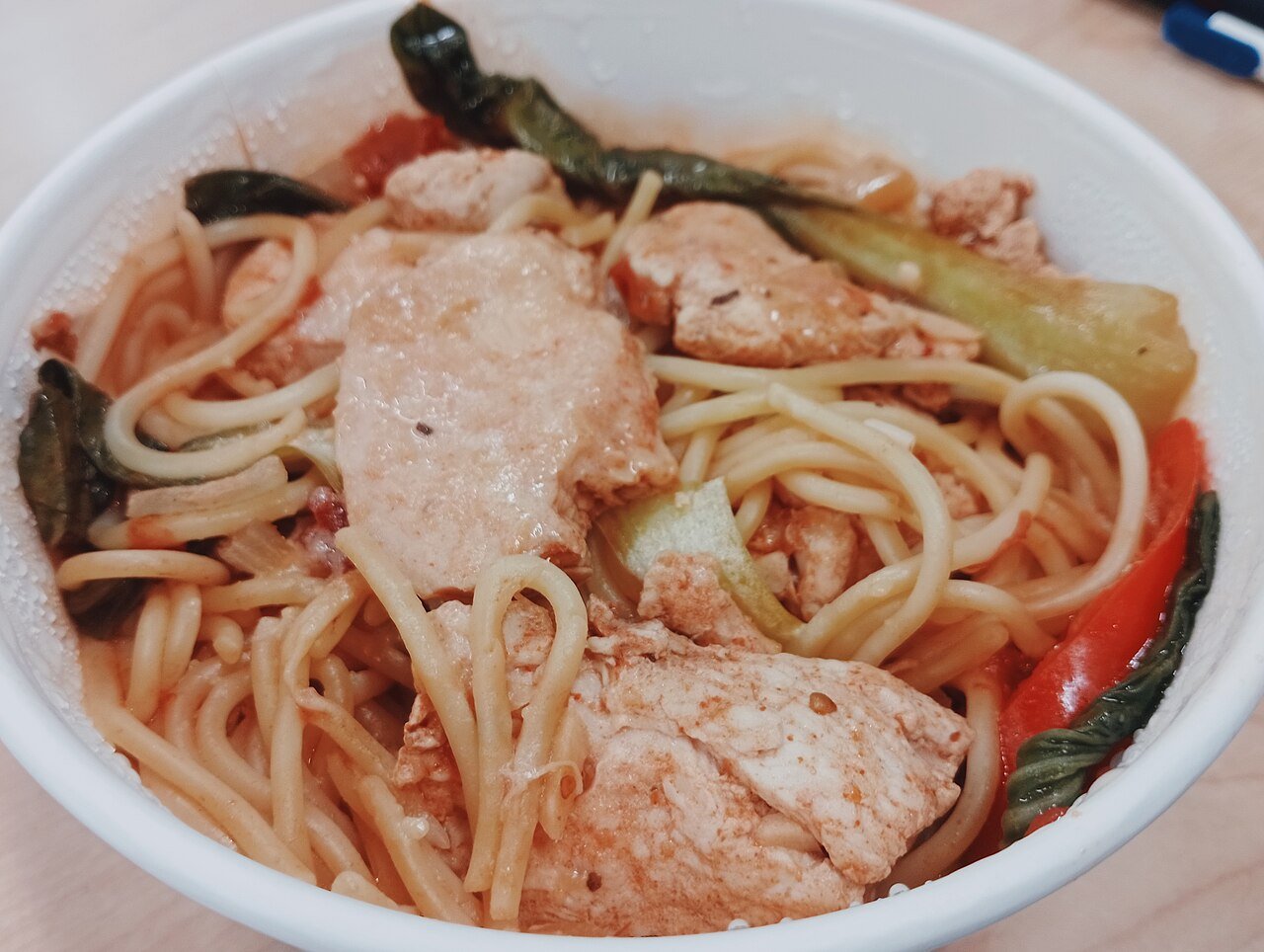 Representative photograph of chicken tomato pasta