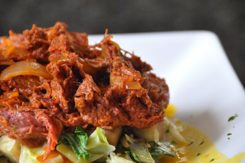 Representative photograph of Cuban Ropa Vieja. The photograph includes accompaniments not included in this draft.