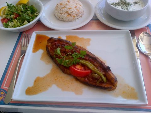 Representative photograph of Karniyarik. The photograph includes side dishes not included in this draft.