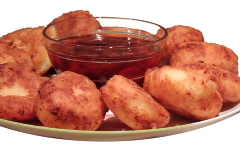 Representative photograph of Syrniki. The photograph includes jam and a different pancake shape than this draft.