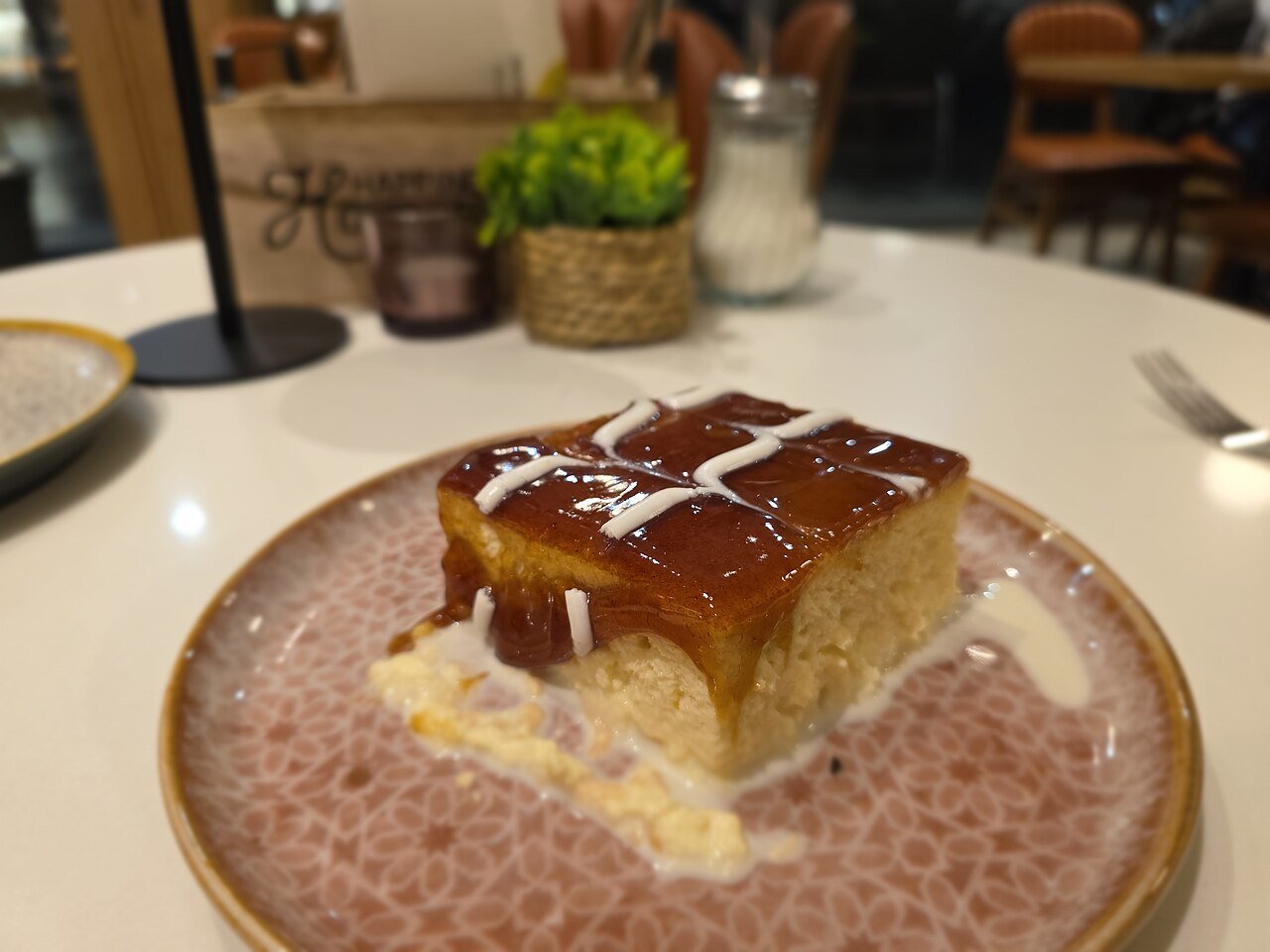 Representative photograph of Tres Leches Cake. The photograph includes a caramel topping; this draft uses whipped cream.