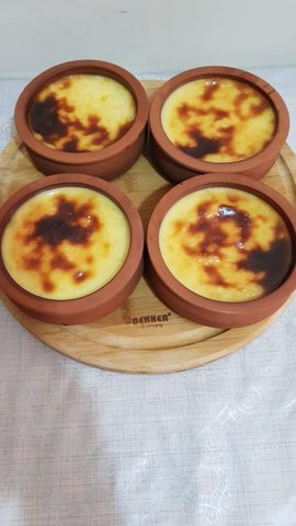 Representative photograph of Turkish Rice Pudding. The photograph shows oven-browned rice pudding; this draft makes a stovetop pudding without a browned top.